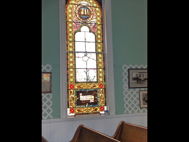 Cornelia Winslow King stained glass window in sanctuary